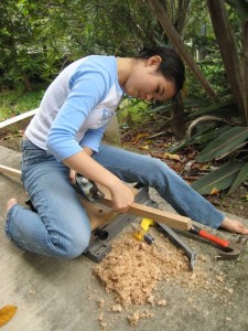 Below me, you can see the Stanley SurForm rasp with its yellow handle, and the orange handle of the hammer