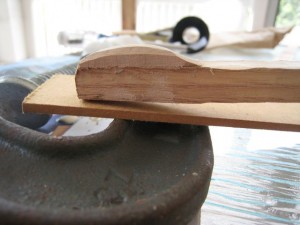 Side view of a sanded maple nock